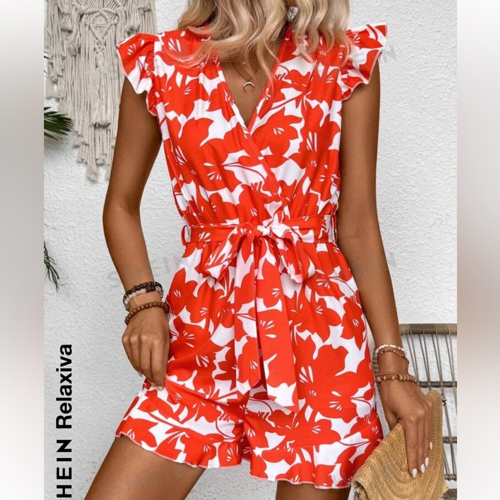 Shein essnc woman floral print cap sleeve romper. Never worn. Brand new
